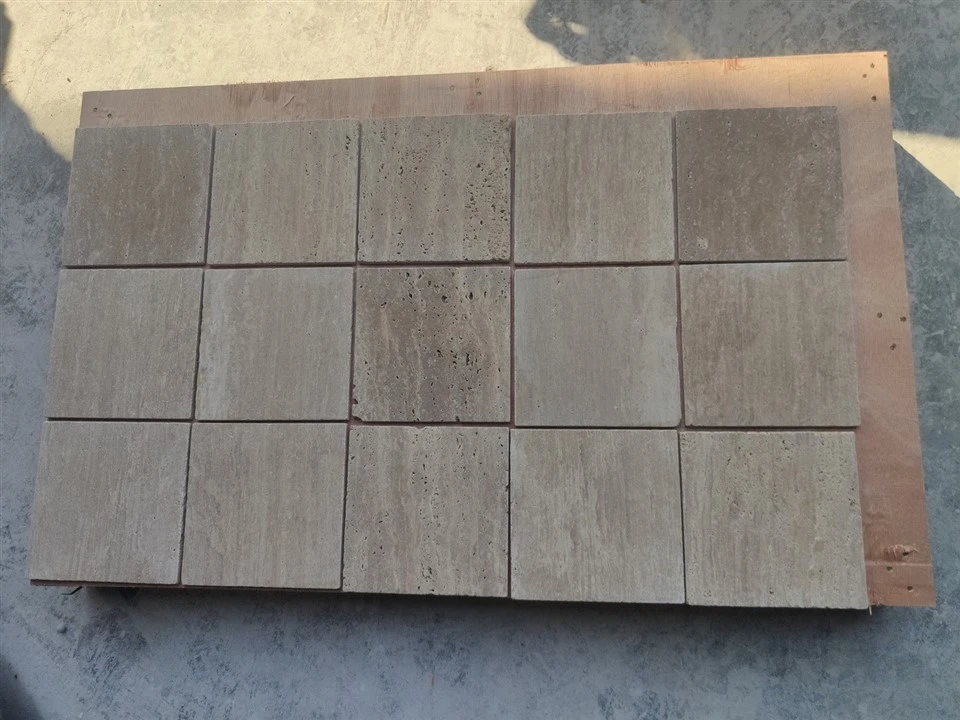 Beige travertijn tuimelde tegels